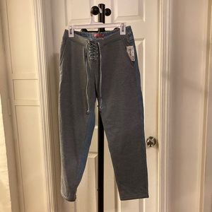 Size medium Blue jeans in the back sweat pants in the front.